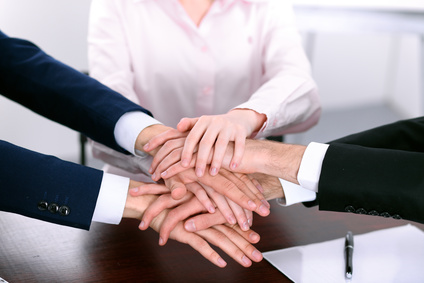 Business people group joining hands